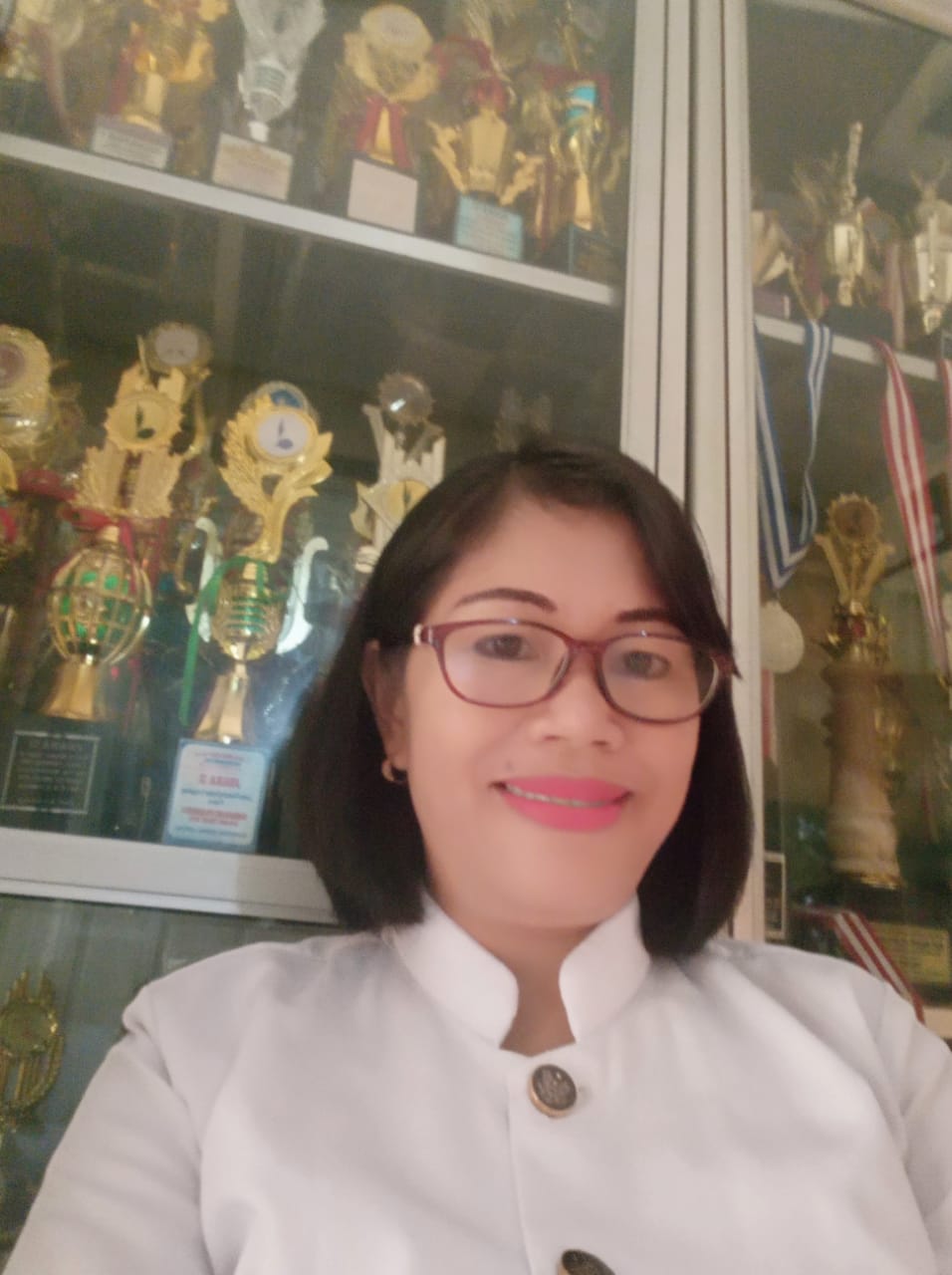 <center>Guru Agama Kristen<br>DORMIN NABABAN, S.PAK</center>